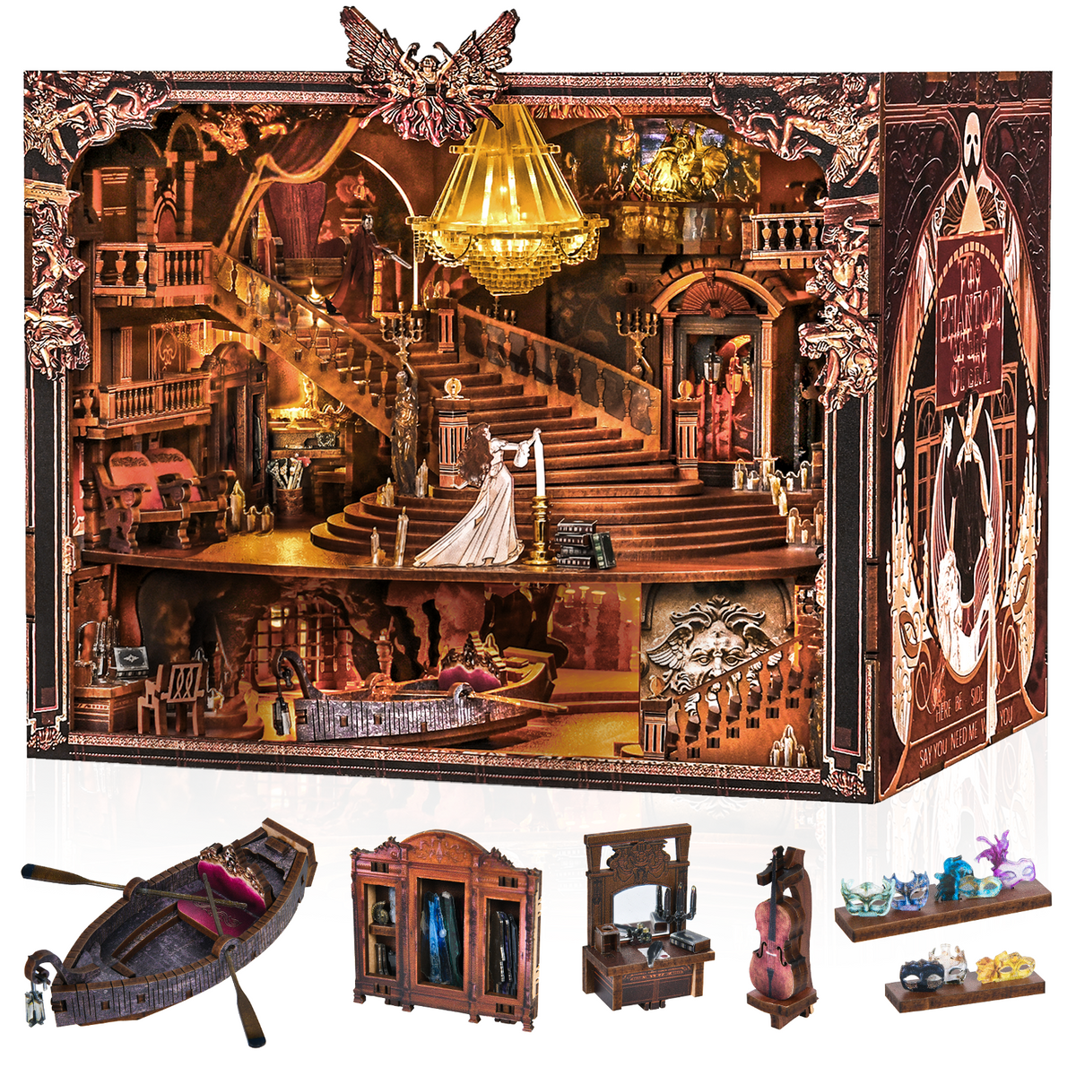 Angled view of the illuminated Phantom of the Opera Max book nook with boat, wardrobe, dressing table and miniature masks shown below.